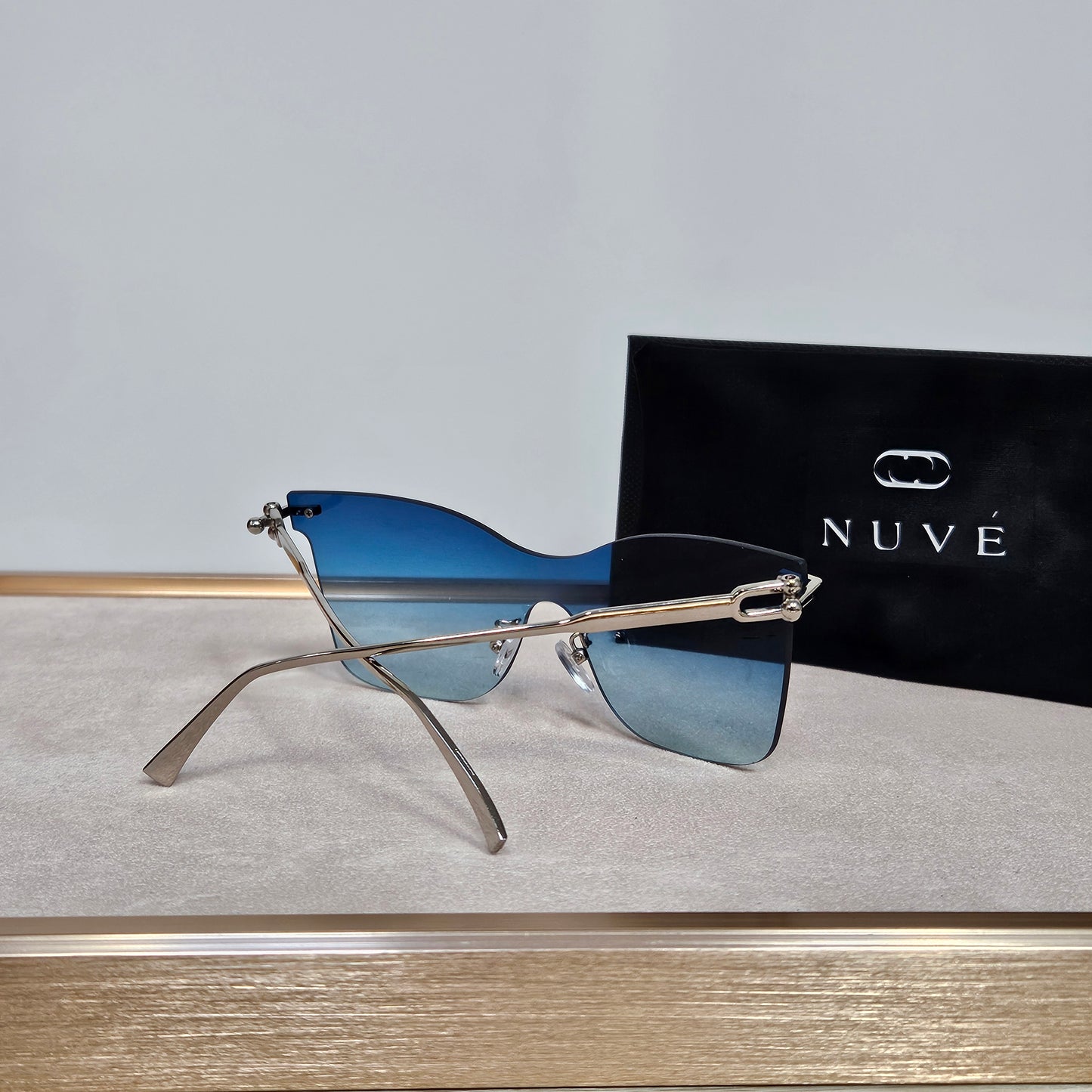 NUVÉ Blue Rimless Gradient Sunglasses