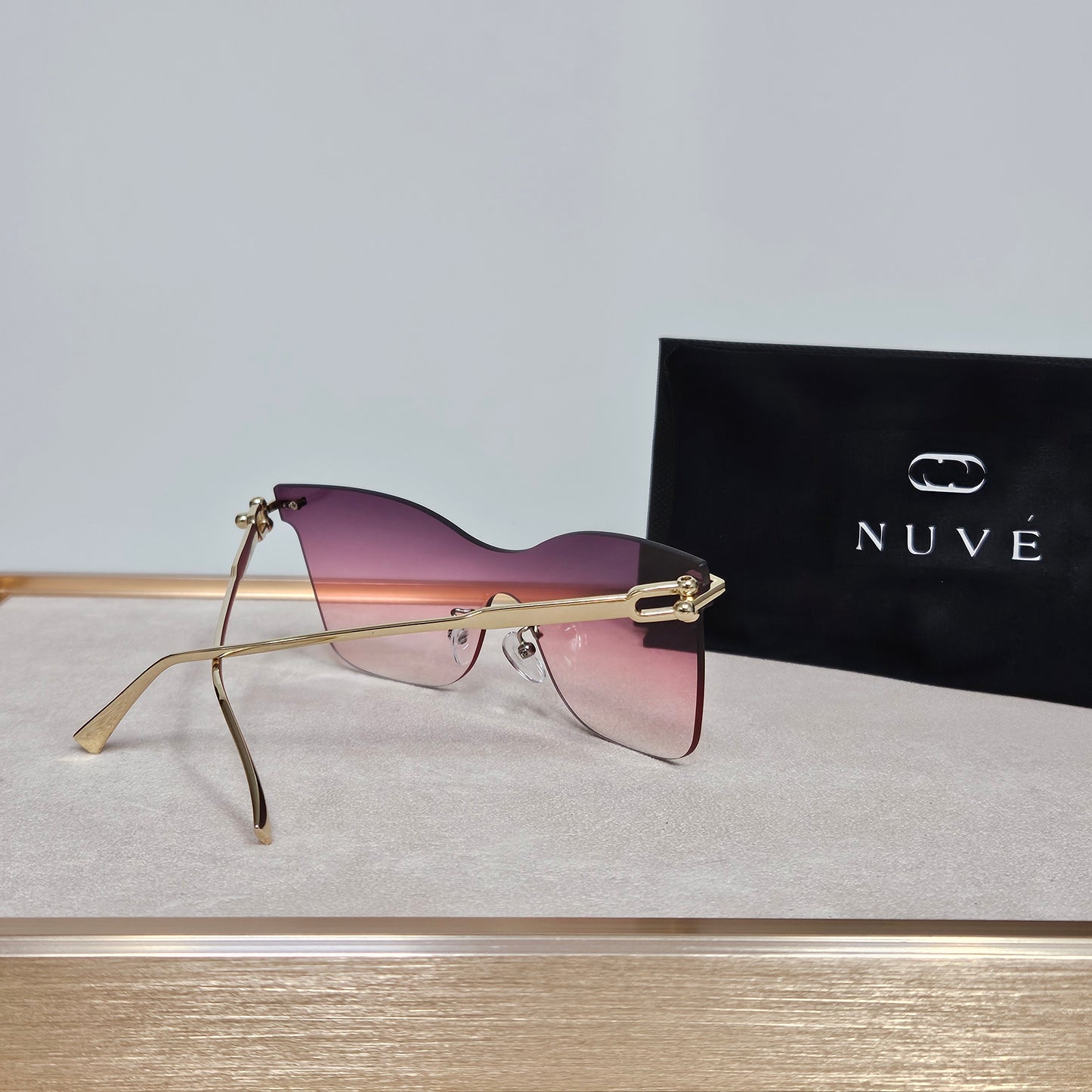 NUVÉ Pink Rimless Gradient Sunglasses