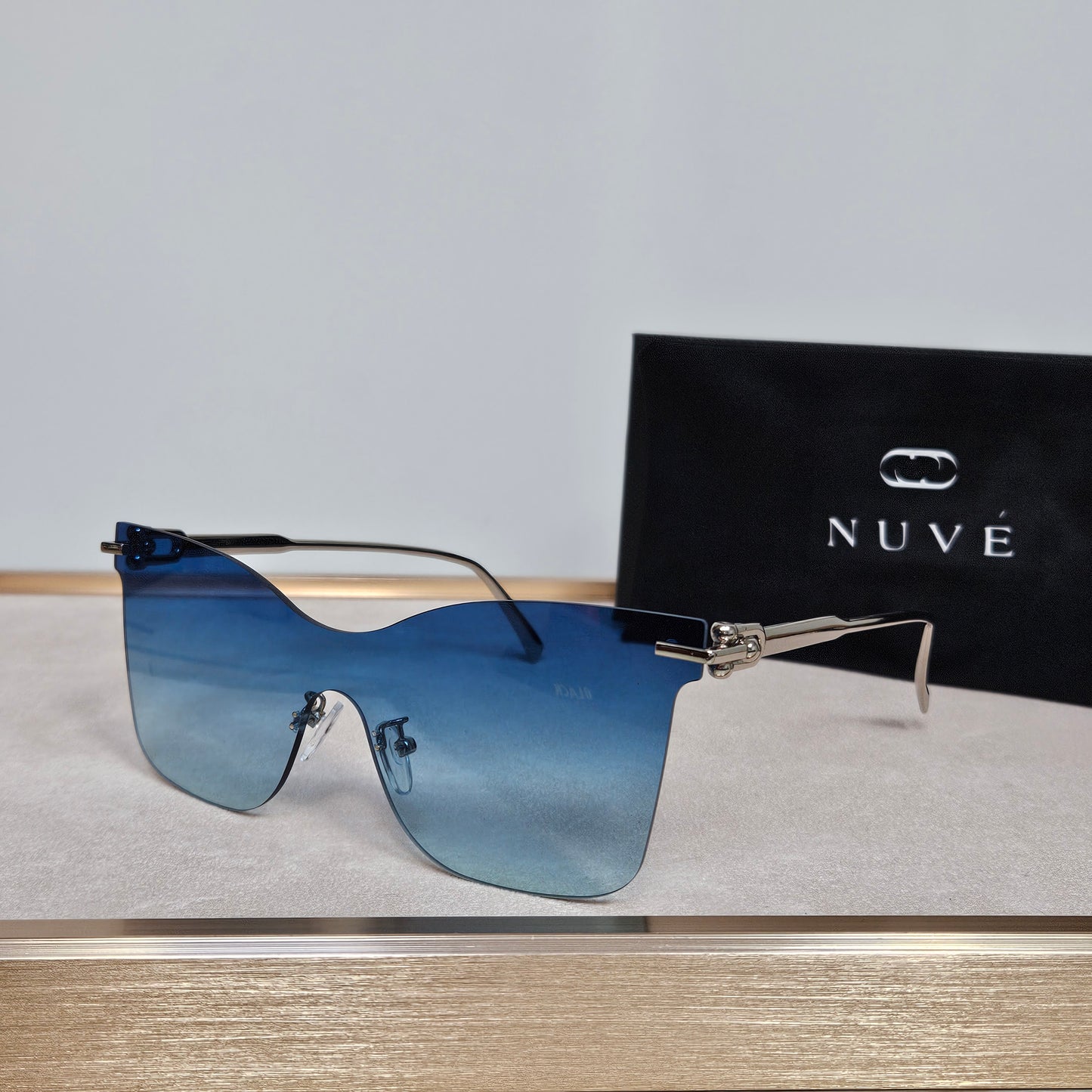 NUVÉ Blue Rimless Gradient Sunglasses