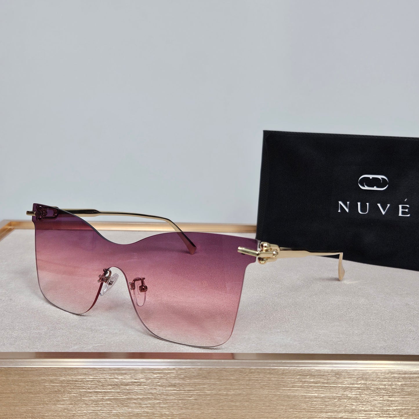 NUVÉ Pink Rimless Gradient Sunglasses